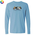Light blue long-sleeve shirt with a graphic of cats and text on a white background