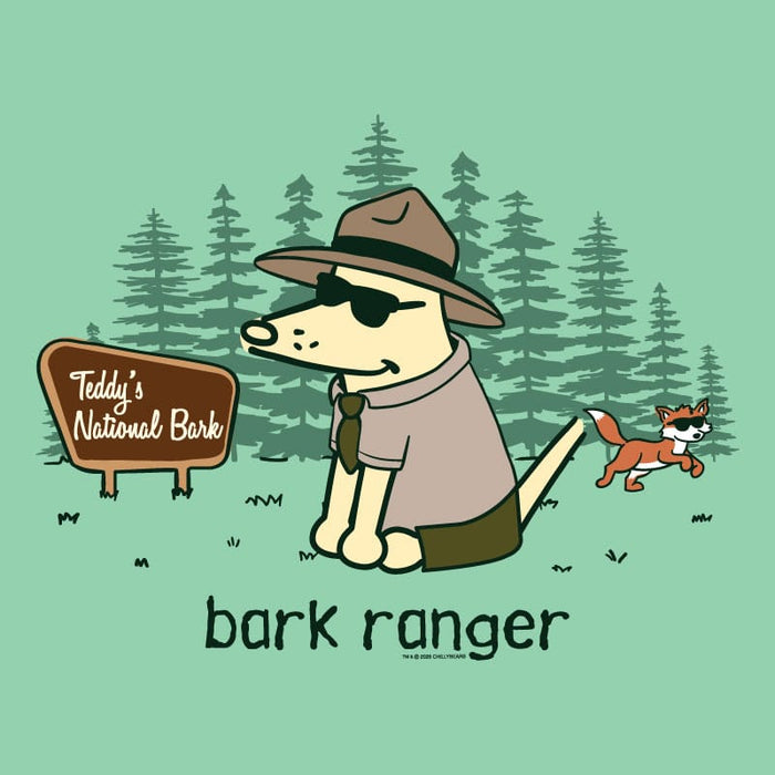 A cartoon illustration of a dog dressed as a park ranger with a hat, sunglasses, and tie, sitting in a forest with pine trees. A sign reads 'Teddy's National Bark' and the text 'bark ranger' appears below.