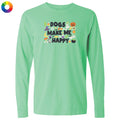 A mint green long-sleeve t-shirt with a colorful graphic on the chest that reads 'DOGS MAKE ME HAPPY' surrounded by Halloween-themed illustrations like a pumpkin, witch hat, and ghost. A small multicolor color wheel icon is visible in the top-left corner.