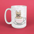 White mug with a cartoon dog in a teacup design and 'frenchie roast' text on a pink background