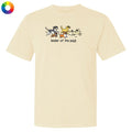 Beige t-shirt with cartoon dogs and 'leader of the pack' text on a white background