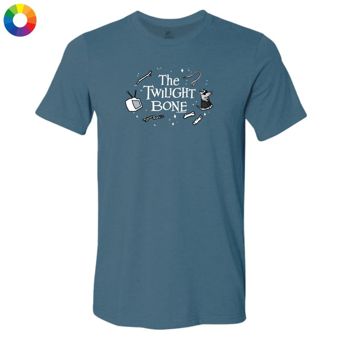 A slate blue short-sleeve t-shirt with a 'The Twilight Zone' graphic on the chest, displayed on a clean white background with a small color wheel icon in the top-left corner.