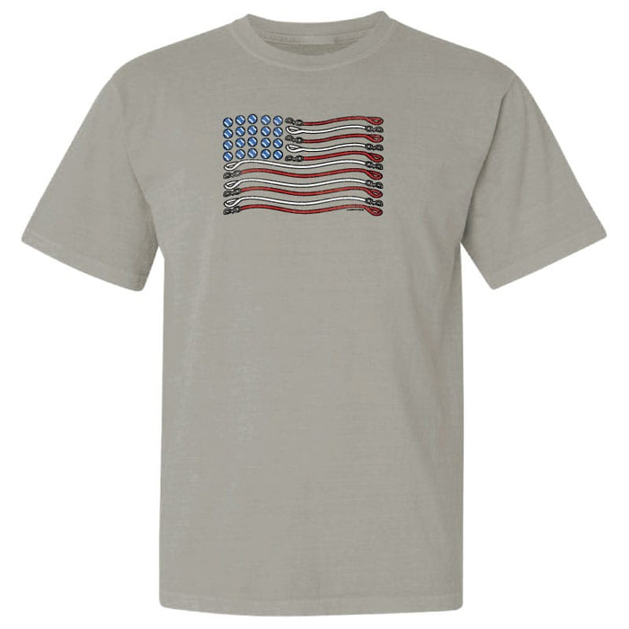 Beige t-shirt with a graphic of an American flag on a white background